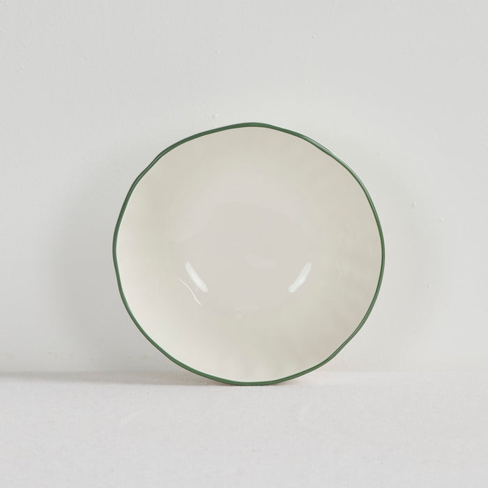 Lotus Bowl - White/green, round white dinnerware bowl with a delicate green rim on a white surface