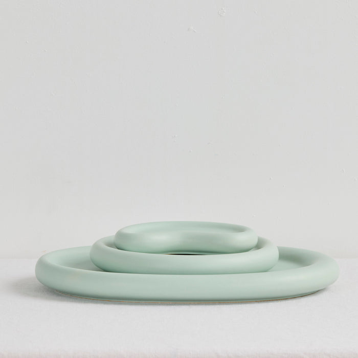 Pebble Large Tray - Sage sage green organic oval serveware tray with a softly raised rounded rim.