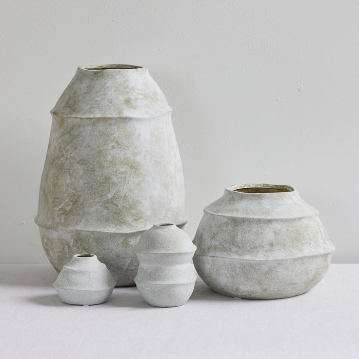 Sculptural Large Ornament - Cement, tiered handcrafted cement ornament styled with smaller matching decorative vessels