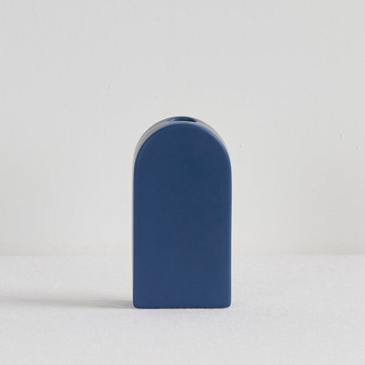 Arch Vase - Blue, sculptural blue ceramic vase with a curved arch silhouette and narrow top opening