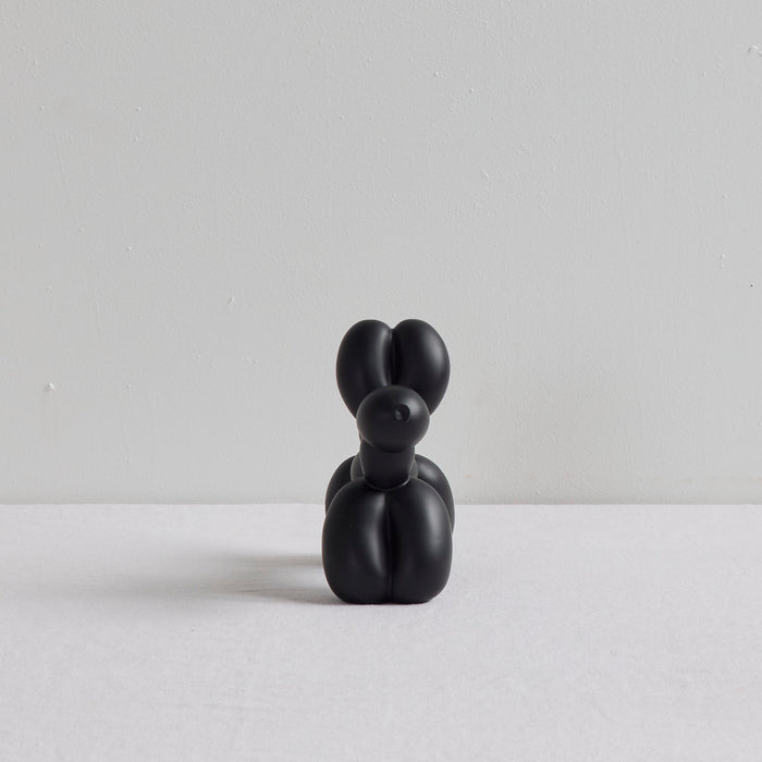 Balloon Dog Object - Black decorative balloon animal sculpture with a sleek black finish on a white surface