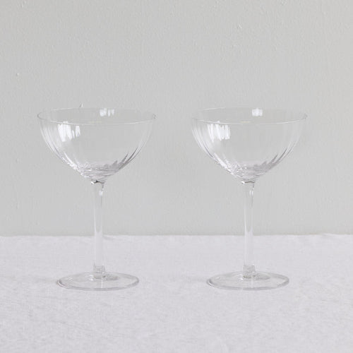 Bravo Coupe Glass Set - 2pc - Clear, two clear lightly fluted cocktail coupe glasses with slender stems.