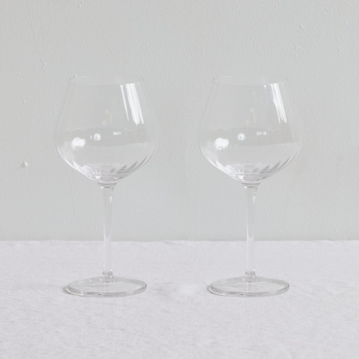 Bravo Still Wine Glass Set - 2pc - Clear, pair of clear stemmed wine glasses with rounded bowls.