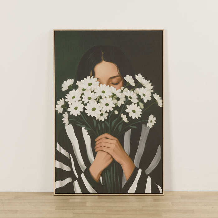 Framed artwork of a person holding white flowers against a dark background
