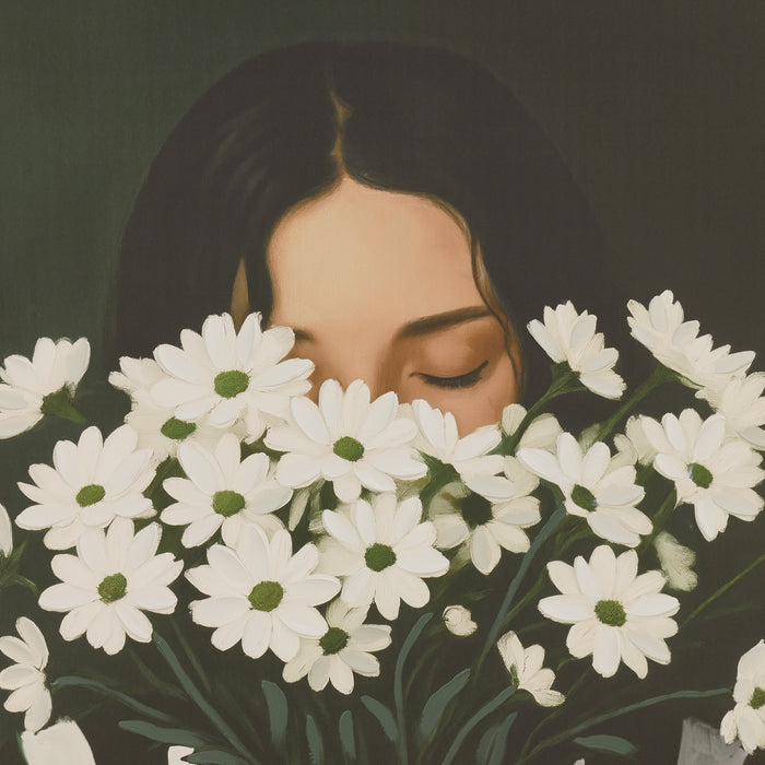Woman with eyes closed surrounded by white flowers on a dark background