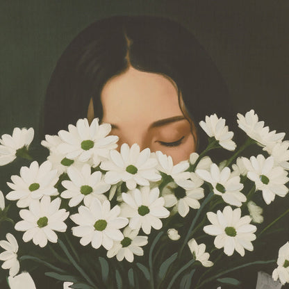 Woman with eyes closed surrounded by white flowers on a dark background