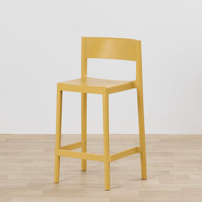 Kip Counter Stool - Yellow with mustard finish, square seat, open backrest and footrest on light timber flooring