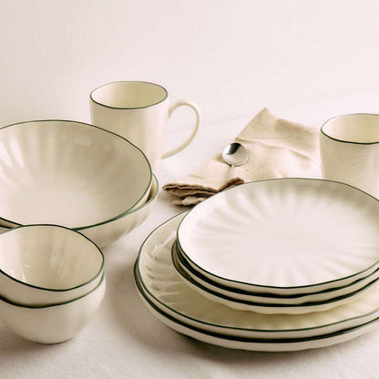 Lotus Mug - White/Green, white mug with fine green rim styled with matching fluted dinnerware on a neutral table setting