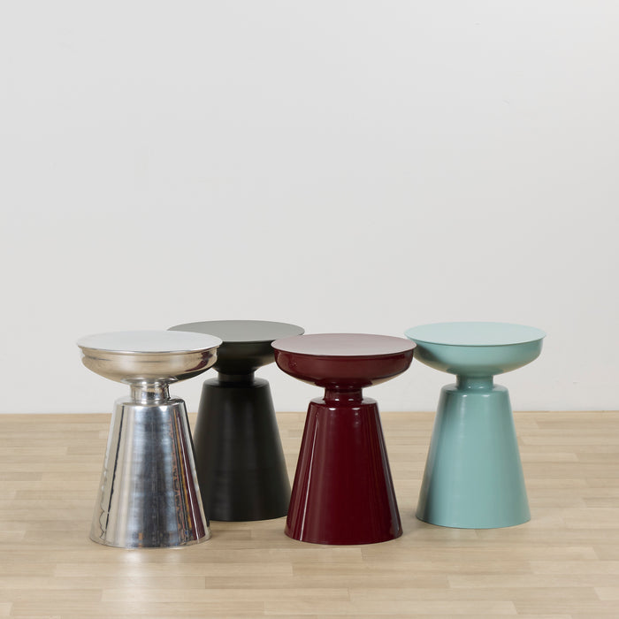 Obelisk Side Table - Mint, mint sculptural side table displayed with chrome, black and burgundy tables on timber flooring