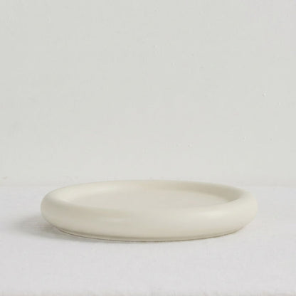 Pebble Medium Tray - Bone, low round bone-coloured tray with a softly raised rim and organic form