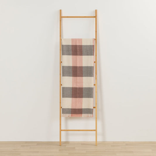 Tara Throw - Choco/Pink checked throw in chocolate, pink and cream draped over a timber ladder.