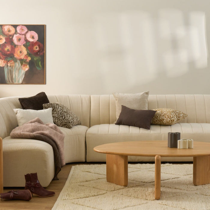 Tiger Cushion - 50x50cm - Old Gold/White, animal motif cushion styled on a cream sectional sofa.
