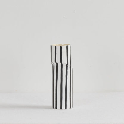 Twist Striped Tall Vase - White/Black, tall sculptural ceramic vase with hand-painted black vertical stripes and offset silhouette.