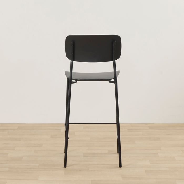 Vincent Counter Stool - Black rear view with curved backrest, slim metal legs and footrest.