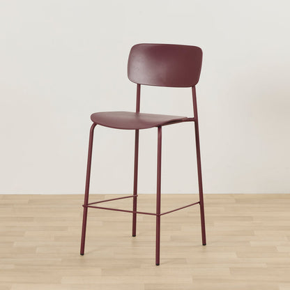 Vincent Counter Stool - Wine, minimalist wine-coloured counter stool with curved backrest, slim metal frame and footrest.