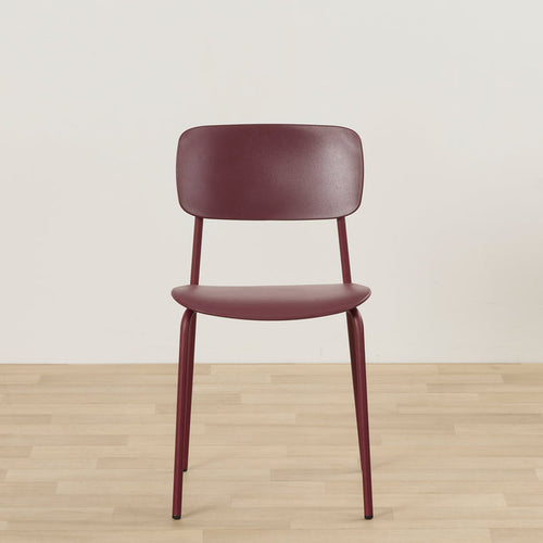 Vincent Dining Chair - Wine, sleek wine-coloured plastic dining chair with a curved backrest and slender legs.